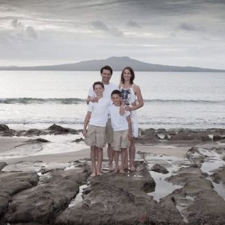Family portrait at Castor Bay beach - Auckland