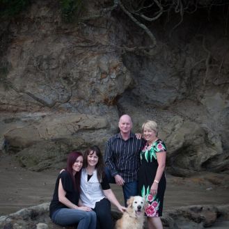 Family portrait at Castor Bay beach