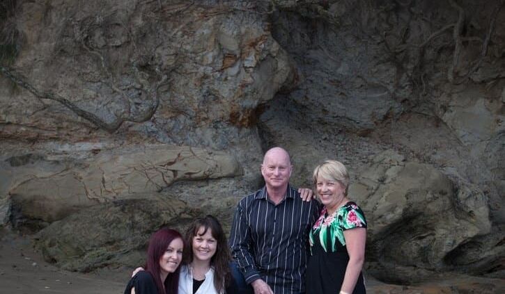 Family portrait at Castor Bay beach